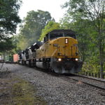 NS Train 203 headed east down Linden Hill with SD90MAC leader #7325 on 9/24/2016.