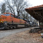 NS train 211 is led by BNSF ES44C4 #6870, NS D9-44CW #9344, and NS SD70M-2 #2656 past the old Southern Railway depot at Markham, Va on 2/16/2017