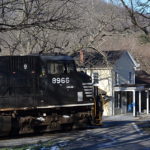 NS 203 led by D9-44CW #8966 passes the Markham, Va post office on 3/16/2017.