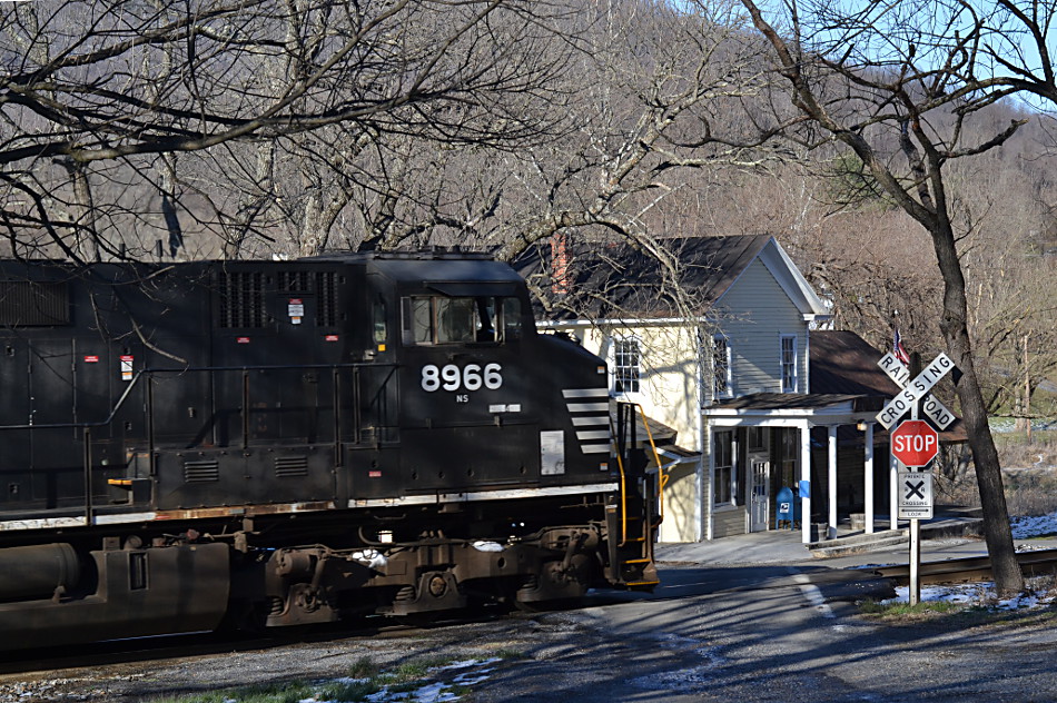 NS 203 led by D9-44CW #8966 passes the Markham, Va post office on 3/16/2017.