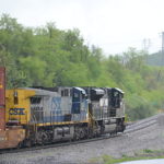 "Clear Woods" - NS 228 heads east on the B-line in Front Royal, Va led by SD70ACe #1004 and CSX AC4400CW #376 on 4/22/2017.