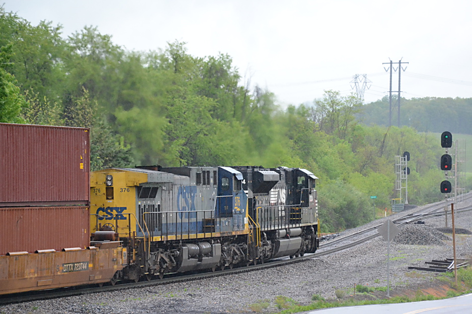 "Clear Woods" - NS 228 heads east on the B-line in Front Royal, Va led by SD70ACe #1004 and CSX AC4400CW #376 on 4/22/2017.