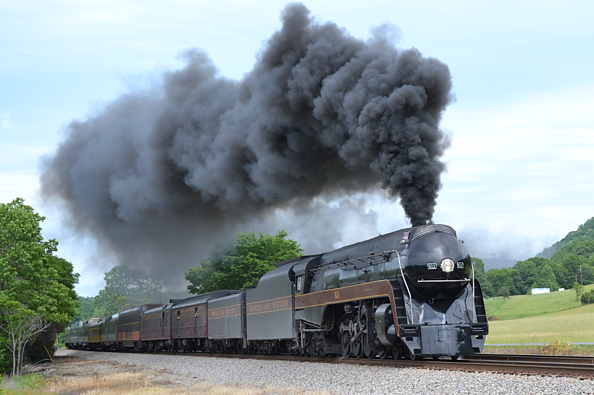 N&W Class J #611 leads NS train 957 westward at Lafayette, Virginia on the NS Christiansburg District during a Roanoke to Walton, Virginia round trip excursion on 5/29/2017.