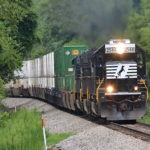 NS SD70 #2544 leads train 211 east through Linden, Va on 7/25/2017.