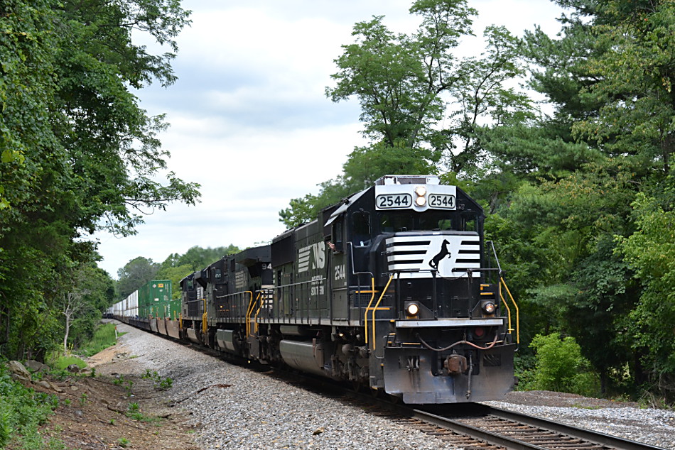 NS SD70 #2544 leads train 211 east through Linden, Va on 7/25/2017.