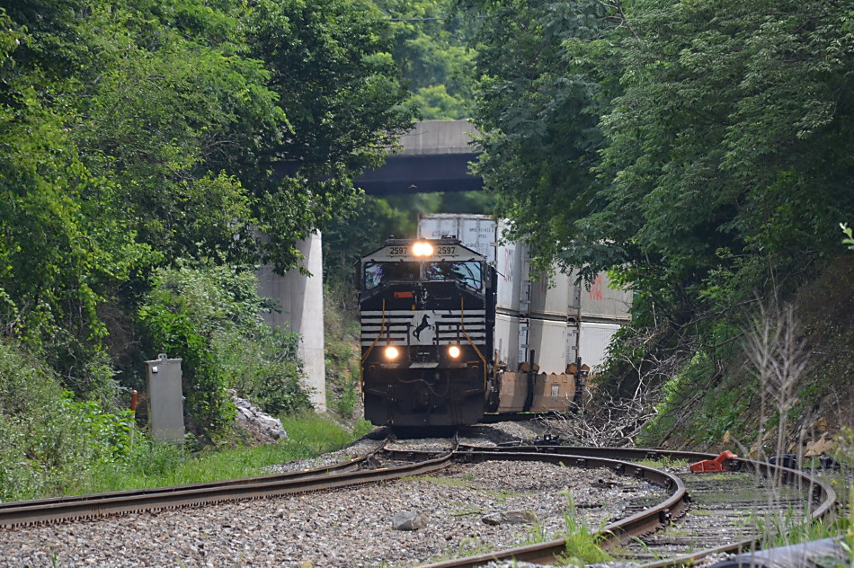 NS train 227 is led by SD70M #2597 as it crests Linden Hill in Virginia on 7/13/2017.