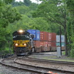 NS train 228 is led by SD70ACe #1068 east at Linden, Va on 7/22/2017.