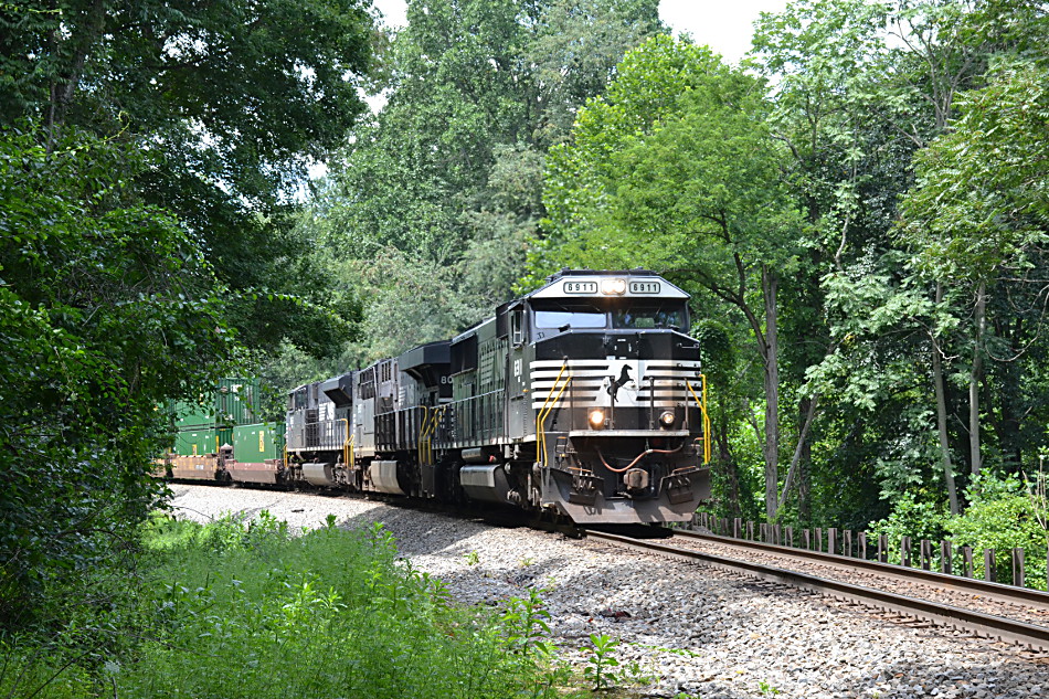 NS train 211 dashes down Linden Hill on the NS B-line in Virginia on 8/8/2017.
