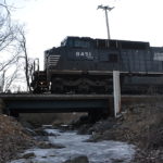 NS train 203 is led by NS (Ex-Conrail) D8-40CW #845 east over a frozen stream in Linden, Va on 1/6/2018.