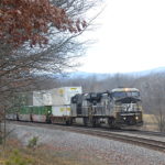 NS train 211 is led by NS D8-40CW #8461 east near Front Royal, Va on 1/12/2018.