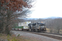 NS train 211 is led by NS D8-40CW #8461 east near Front Royal, Va on 1/12/2018.