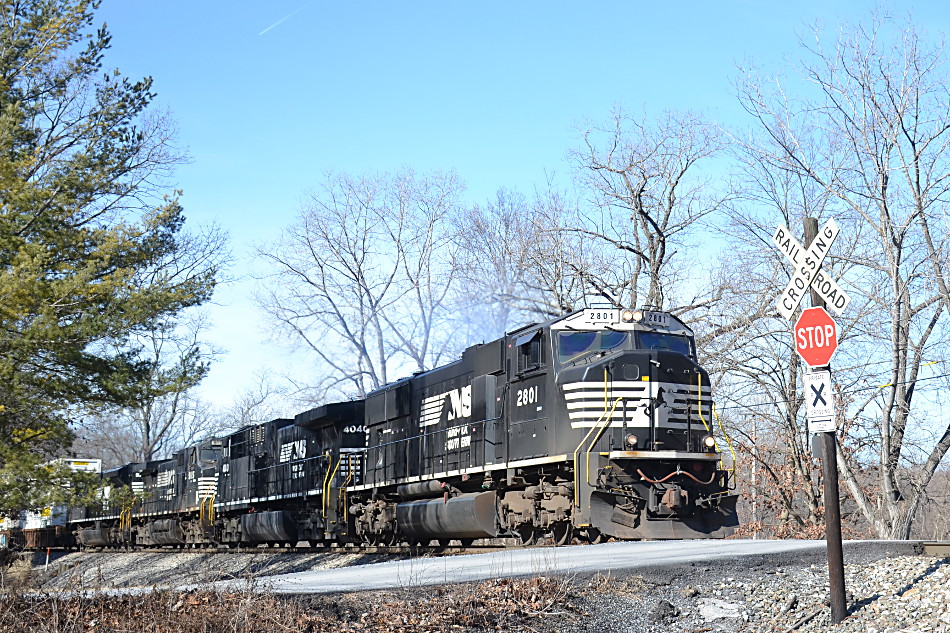 NS SD75 #2801 leads train 211 east through Linden, Virginia on 1/26/2018.