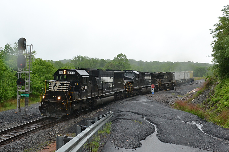 NS SD60 #6597 leads train 201 south at Riverton Junction, Virginia on 5/17/2018.