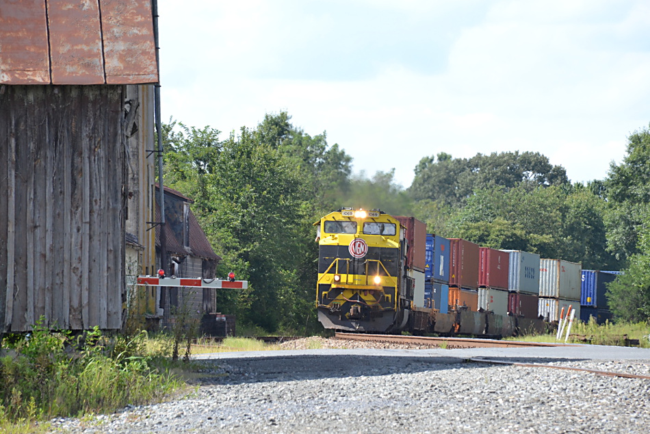NS train 228 is led by NS SD70ACe #1069 east through Marshall, Virginia on 8/25/2018.