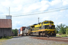 NS train 228 is led by NS SD70ACe #1069 east through Marshall, Virginia on 8/25/2018.