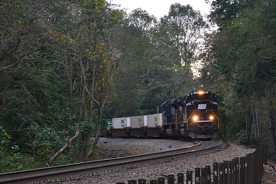 NS SD70ACe #1073 (Penn Central heritage unit) leads train 203 east down Linden Hill on the NS B-line on 10/06/2018.