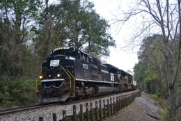 NS SD70ACe #1073 (Penn Central heritage unit) leads train 203 east down Linden Hill on the NS B-line on 10/06/2018.