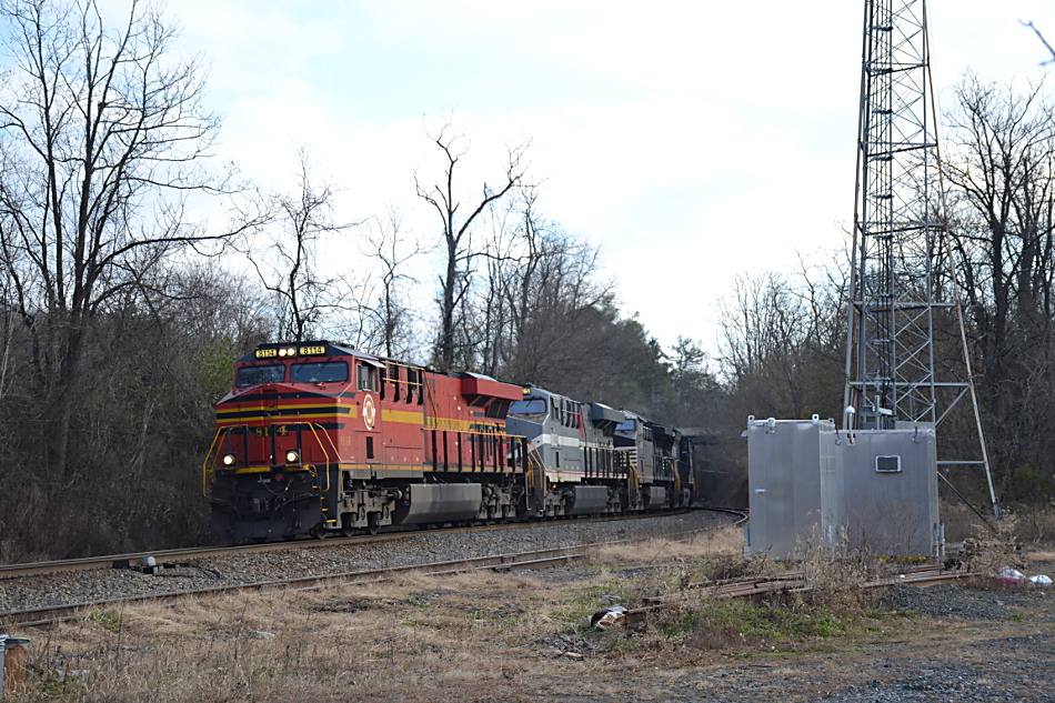 NS train 777 is led through Linden, VA by ES44AC #8114 (Original NS heritage unit), ES44AC #8025 (Monongahela heritage unit), AC44C6M #4169 and ET44AC #3663 on 11/16/2019.