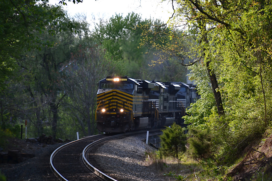  After stopping at the control point at Cody, NS ES-44AC #8100 leads train 203 east near Linden, VA on 5/7/2020. 