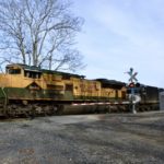 NS train 12R is led west at Belle Meade, VA by NS SD70ACe #1067 (the Reading Company Heritage unit) on 12/15/2020.
