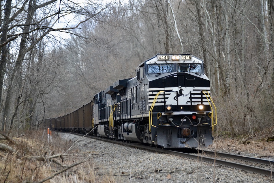 NS AC44C6Ms 4446 & 4370 lead train 779 west up Linden Hill in Virginia on 2/18/2022.