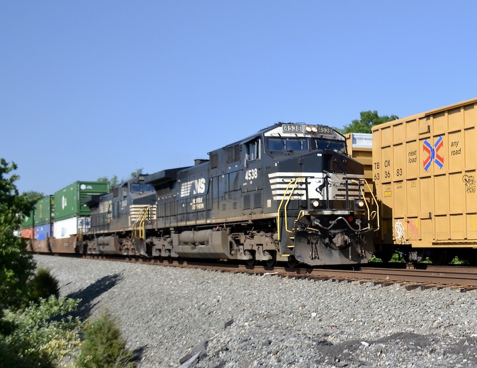 Southbound Norfolk Southern AC44C6M 4538 leads NS train 27A past northbound train 12R at Ashby Station Road.