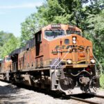BNSF locomotives lead a Norfolk Southern train