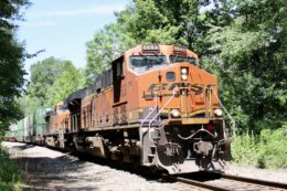 BNSF locomotives lead a Norfolk Southern train